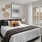 apartment bedroom with wood plank flooring and window coverings