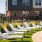 white poolside lounge chairs